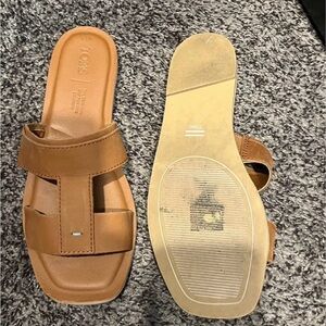Brown TOMS slip on sandals size 7.5
